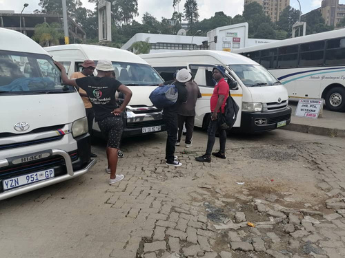 Passengers preparing to board a kombi to Johannesburg at the Mbabane Bus Rank.