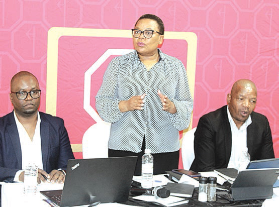 SBS SBS Bank MD Mbali Sibanyoni speaking during the breakfast meeting with the Editors Forum which was held at the Mountain View Hotel yesterday. Flanking the MD is Manager Legal Velaphi Dlamini and General Manager Leonard Dlamini. (Pics: Mduduzi Mngomezulu)
