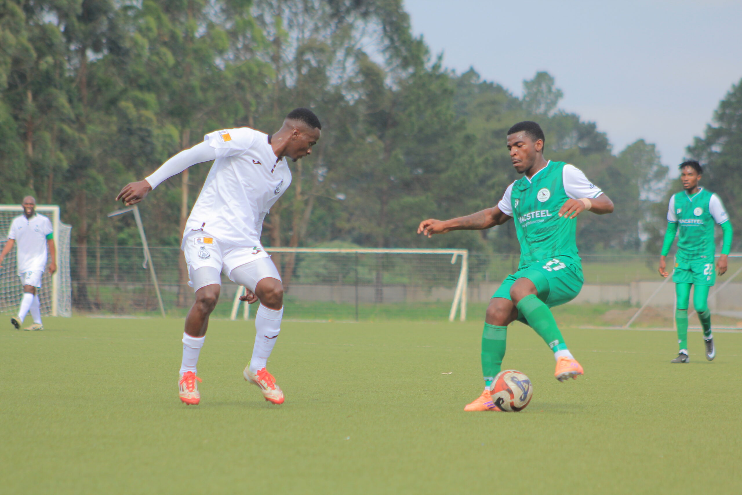 Nsingizini Hotspurs’ Kwaakhe Thwala tries to dribble past Green Mamba’s Colani Dlamini.