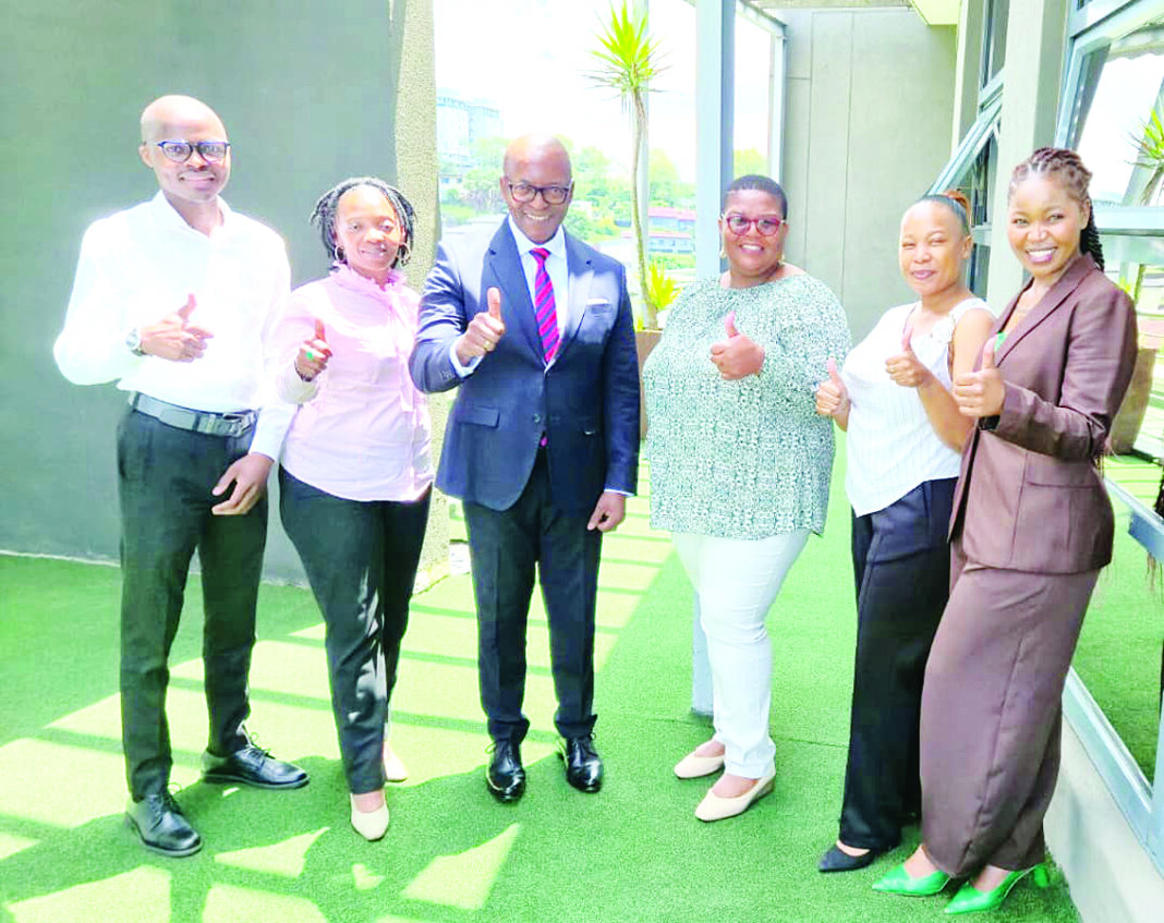 BE CEO E. Nathi Dlamini , SMVAF CEO Khangeziwe Mabuza flanked by Business Eswatini team after the fruitful engagement at BE Offices at Emafini.