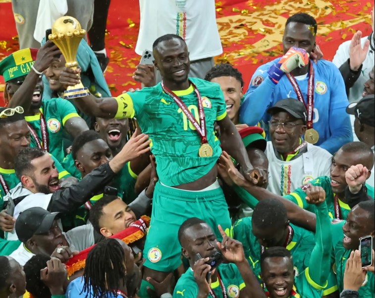 Senegal Senegal's Sadio Mané holds the Africa Cup of Nations trophy in January.