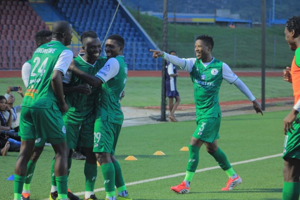 Nsingizini Hotspurs players celebrate after scoring one of their goals.