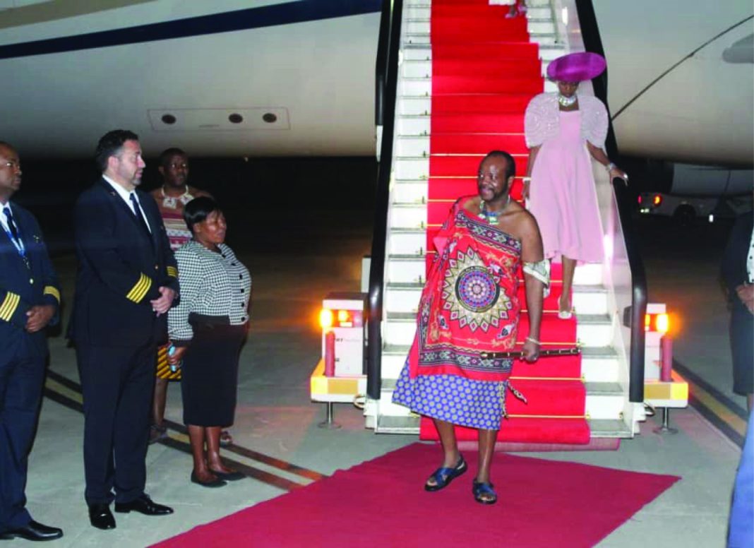 King Back His Majesty King Mswati III and Inkhosikati LaMashwama upon arrival at the KMIII International Airport.