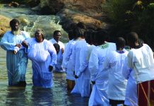 Over 100 Nazareth Church members baptised A section of Shembe members lining up for baptism in Mahlanya.