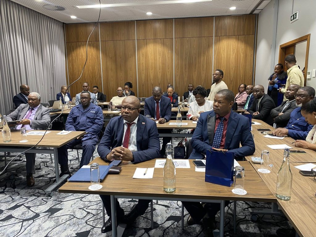 Minister of Commerce, Industry and Trade Manqoba Khumalo follow proceedings with House of Assembly Portfolio Committee Chairperson Masiphula Mamba during a workshop held at the Hilton Garden Inn yesterday.