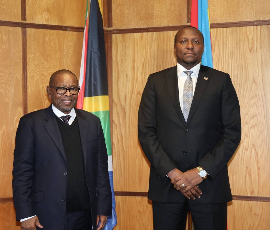Blade Prime Minister Russell Mmiso Dlamini gestures as he meets South Africa’s Minister of Higher Education, Science and Technology Blade Nzimande at the Private and Cabinet Office yesterday afternoon.