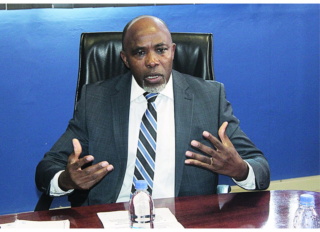 UN Resident Coordinator George Wachira stresses a point during a meeting with the Eswatini Observer staff.