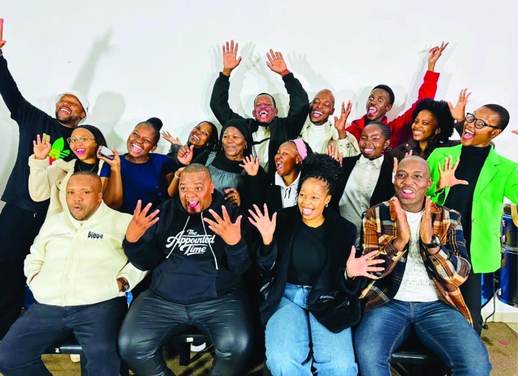 The chosen backing vocalists and adjudicators pose after the auditions at the Manzini Arts and Culture Studios on Saturday.