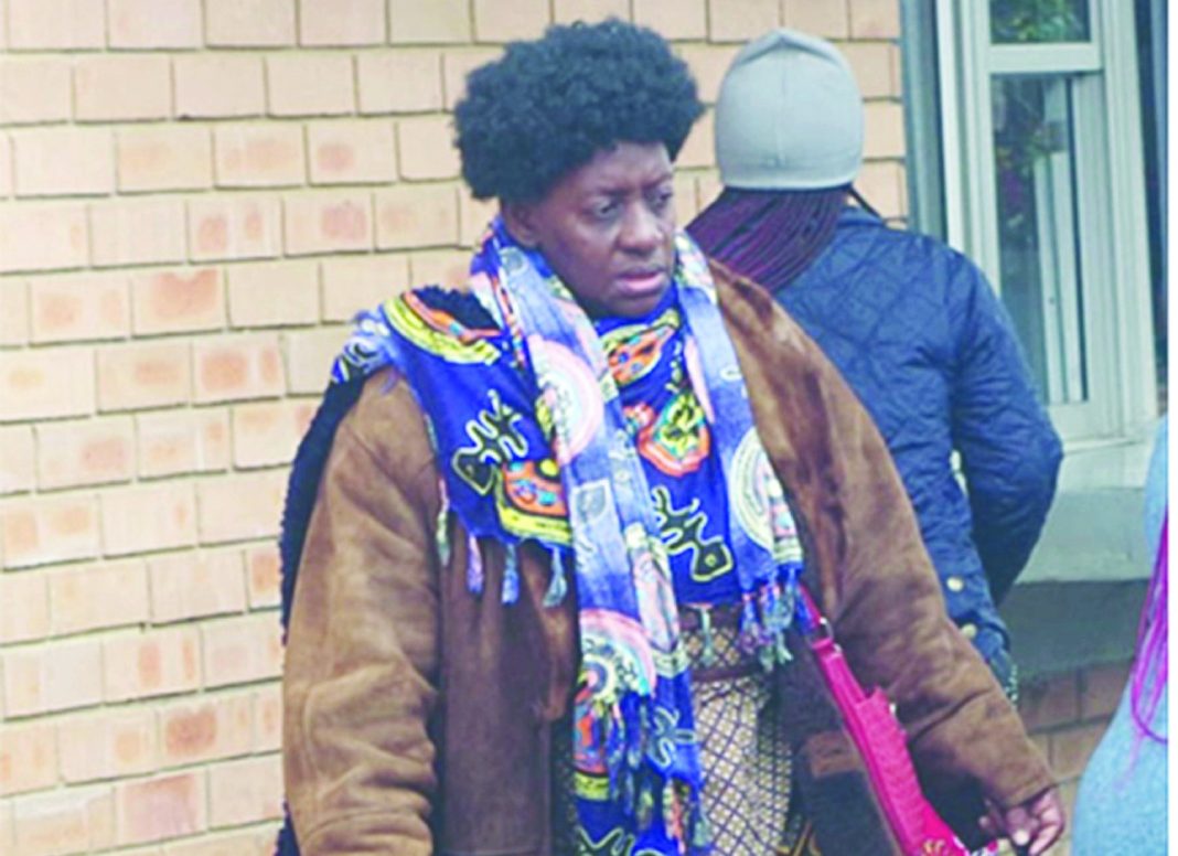 Fake Death Jabu Maseko-Kunene walking to the police van after pleading guilty to two counts of fraud at the Mbabane Magistrate’s Court.