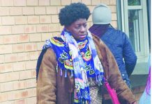 Woman fakes hubby’s death to claim benefits Jabu Maseko-Kunene walking to the police van after pleading guilty to two counts of fraud at the Mbabane Magistrate’s Court.