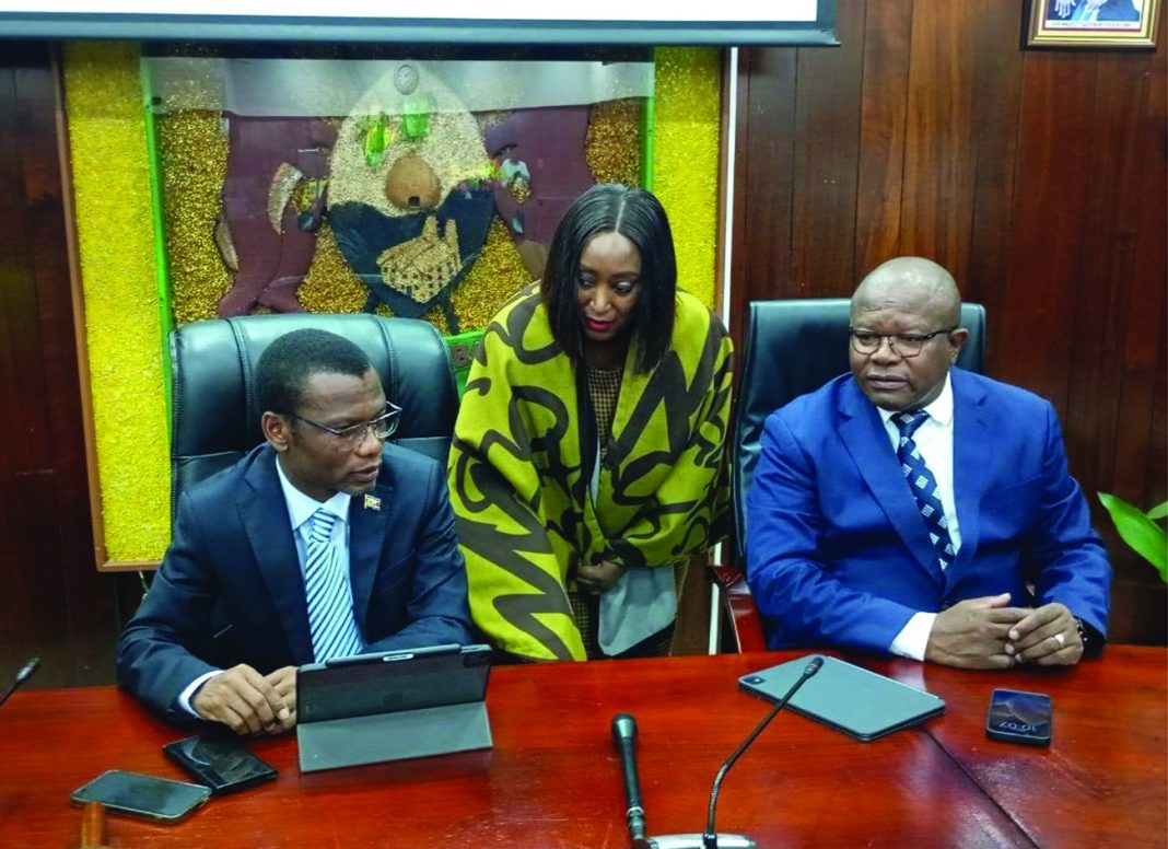 Minister of Housing and Urban Development Appolo Maphalala, Manzini Municipal Council Chief Executive Officer Lungile Dlamini and the Minister of Commerce Industry and Trade Manqoba Khumalo in a conversation during the meeting.