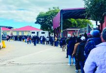 SA border chaos as June 30 deadline looms Some of the tourists queuing for their passports to be stamped.