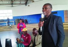 Get back our club, Birds supporters tell board Mbabane Swallows physical coach Siza 'King Pele' Dlamini addressing club supporters at MDS Hall yesterday.