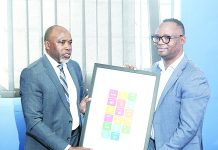 UN Resident Coordinator admires King’s push for UN reform Acting Eswatini Observer MD Mbongeni Mbingo accepts a gift from the UN Resident Coordinator George Wachira during his visit to the Eswatini Observer offices yesterday.