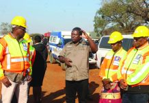 Communities hope to revive local economy Minister of Public Works and Transport Chief Ndlaluhlaza Ndwandwe explains to the prime minister and his delegation the logistics of the tour at the starting point