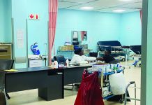 Govt pays 70% of on-call allowances A doctor at Mbabane Government Hospital assisting a patient yesterday.