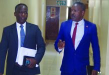 MPs to get E356 455 backpay this month MPs Michael Masilela and Jabulani Simelane arrive. (Pics: Mduduzi Mngomezulu)